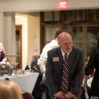Dr. Jeffrey Potteiger speaking with guests at the Fall 2022 Citations Awards